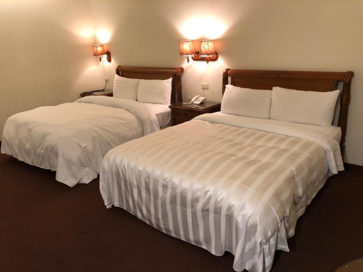 England Business Motel Yilan Екстер'єр фото